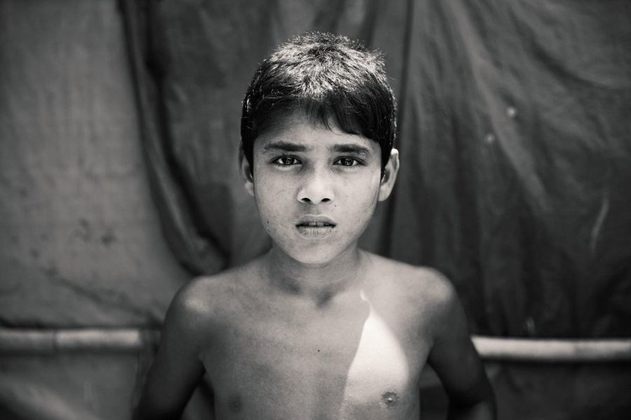 Portrait of a Boy, Bangladesh: black and white portrait of a boy looking into the camera. Photograph by Marcus Vallance.